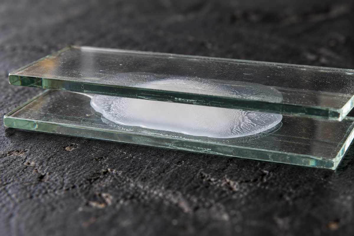 Physical zinc oxide emulsion compressed between laboratory optical glass slides
